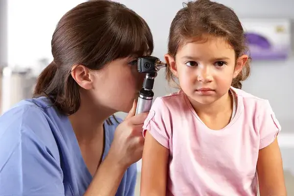 depositphotos_24652475-stock-photo-doctor-examining-childs-ears-in